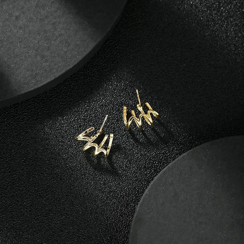 Multi-hole effect claw earrings - Angelenita